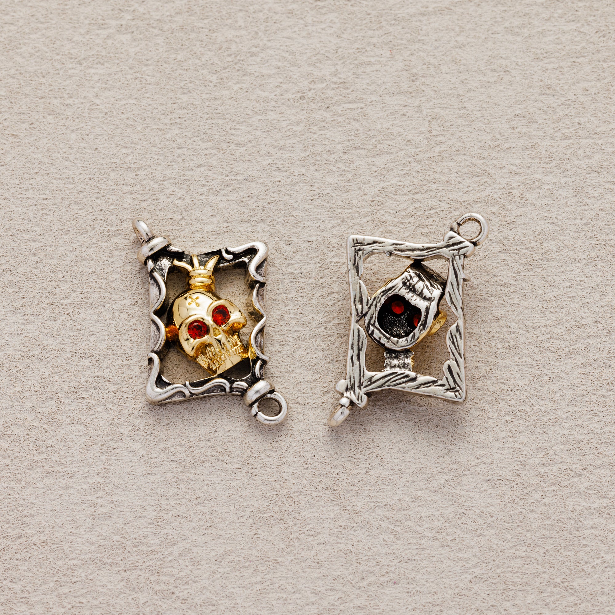 Launch Promo: Stainless Steel Gothic Framed Red Eye Skull Connector | Sold Each