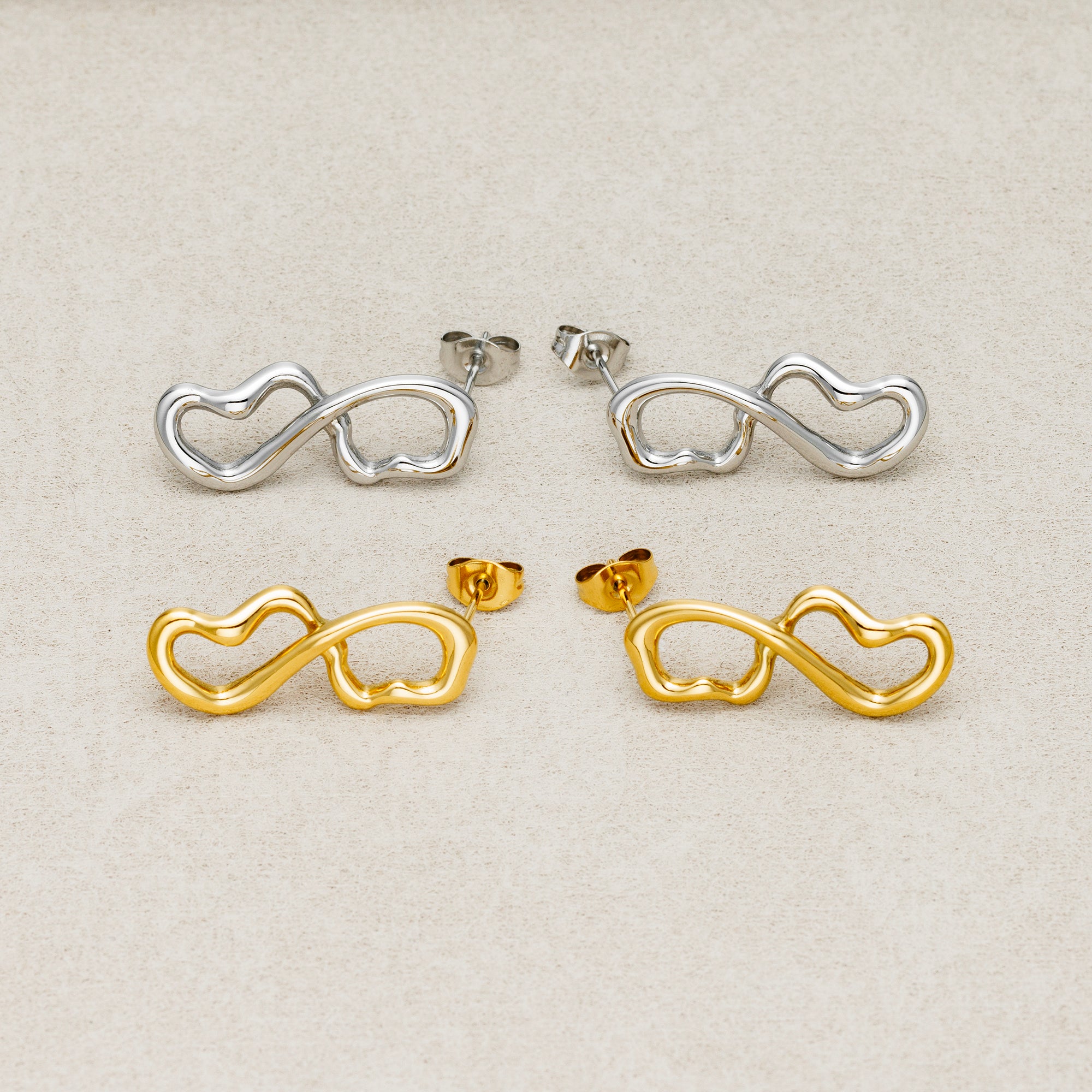 Launch Promo: 24K Gold PVD Stainless Steel Molten Infinity Love Stud Earring in Gold & Silver